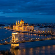 Budapest Wall Art canvas print, the neo-gothic Parliament building lit gold along the Danube at blue hour with the chain