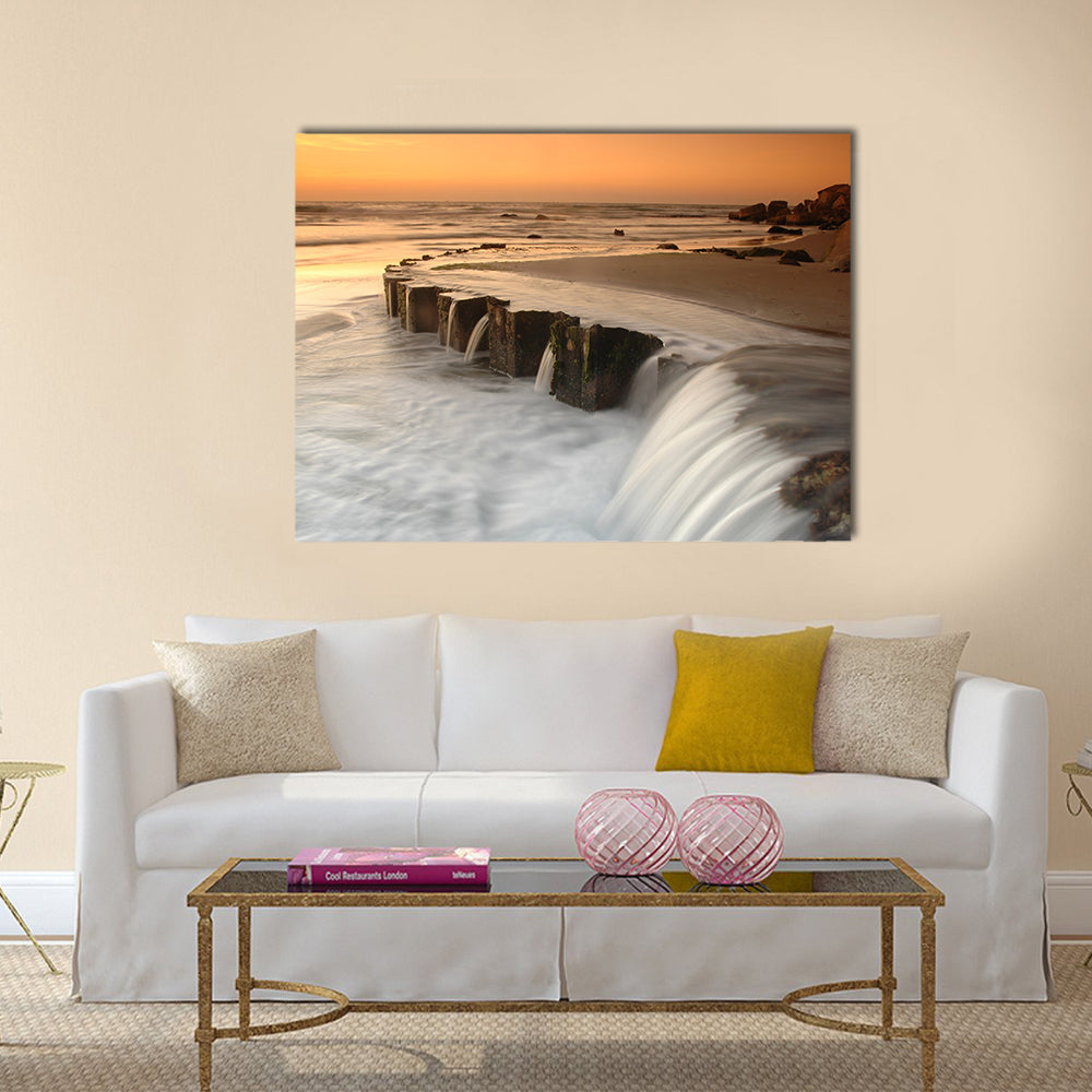 Waterfall By The Sea At Sunset Canvas Wall Art