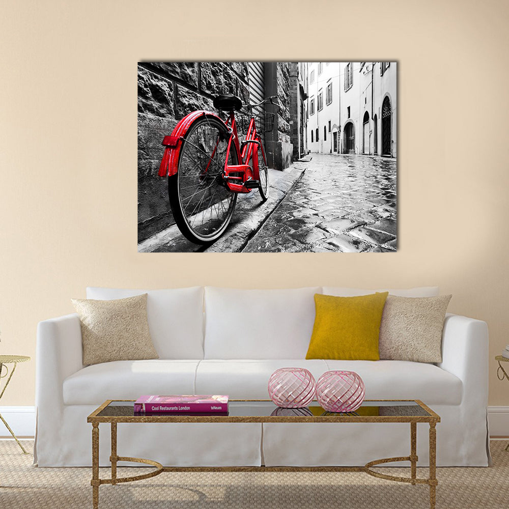 Red Bicycle on Cobblestone Street Canvas Wall Art