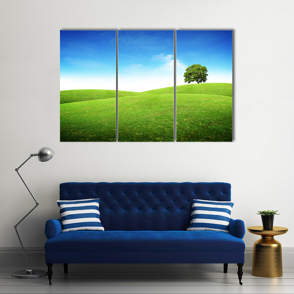 Lone Tree on Rolling Green Hills Canvas Wall Art