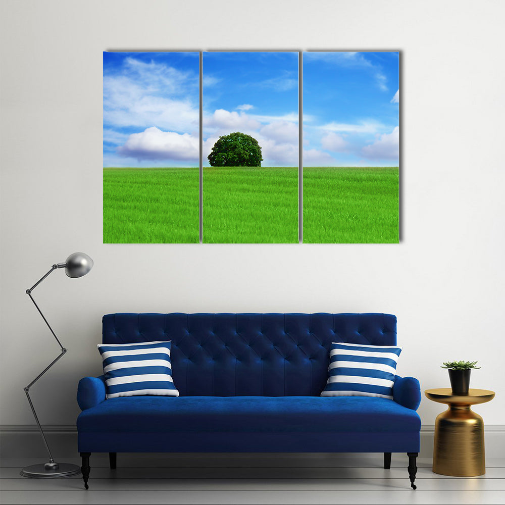 Lone Tree in Vibrant Green Field Canvas Wall Art