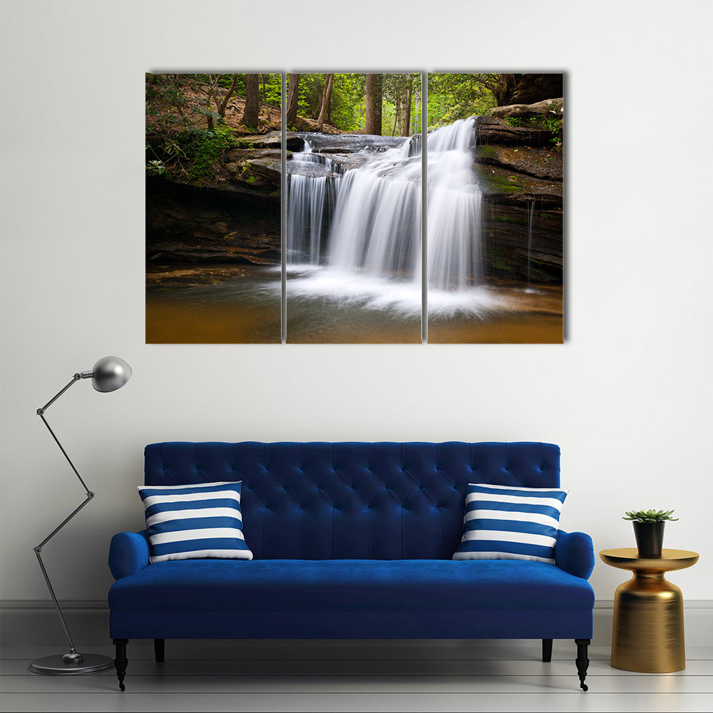Cascading Forest Waterfall Over Layered Rocks Canvas Wall Art