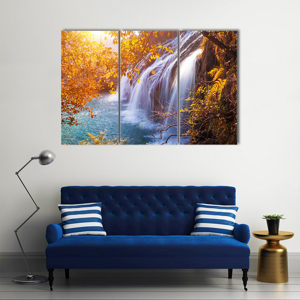 Autumn Waterfall with Sunlit Foliage Canvas Wall Art
