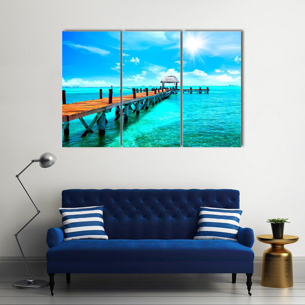 Sunlit Wooden Pier and Thatched Hut Canvas Wall Art