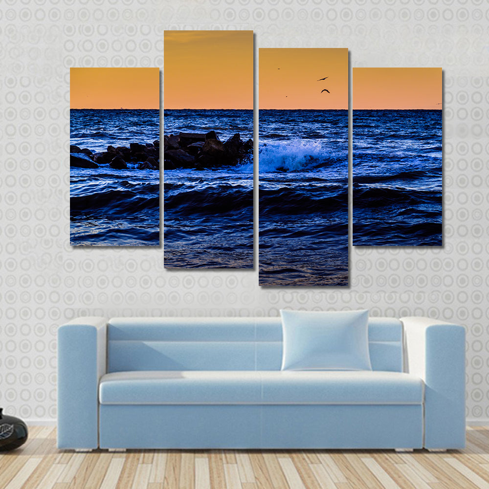 Blue Ocean Waves at Sunset Canvas Wall Art