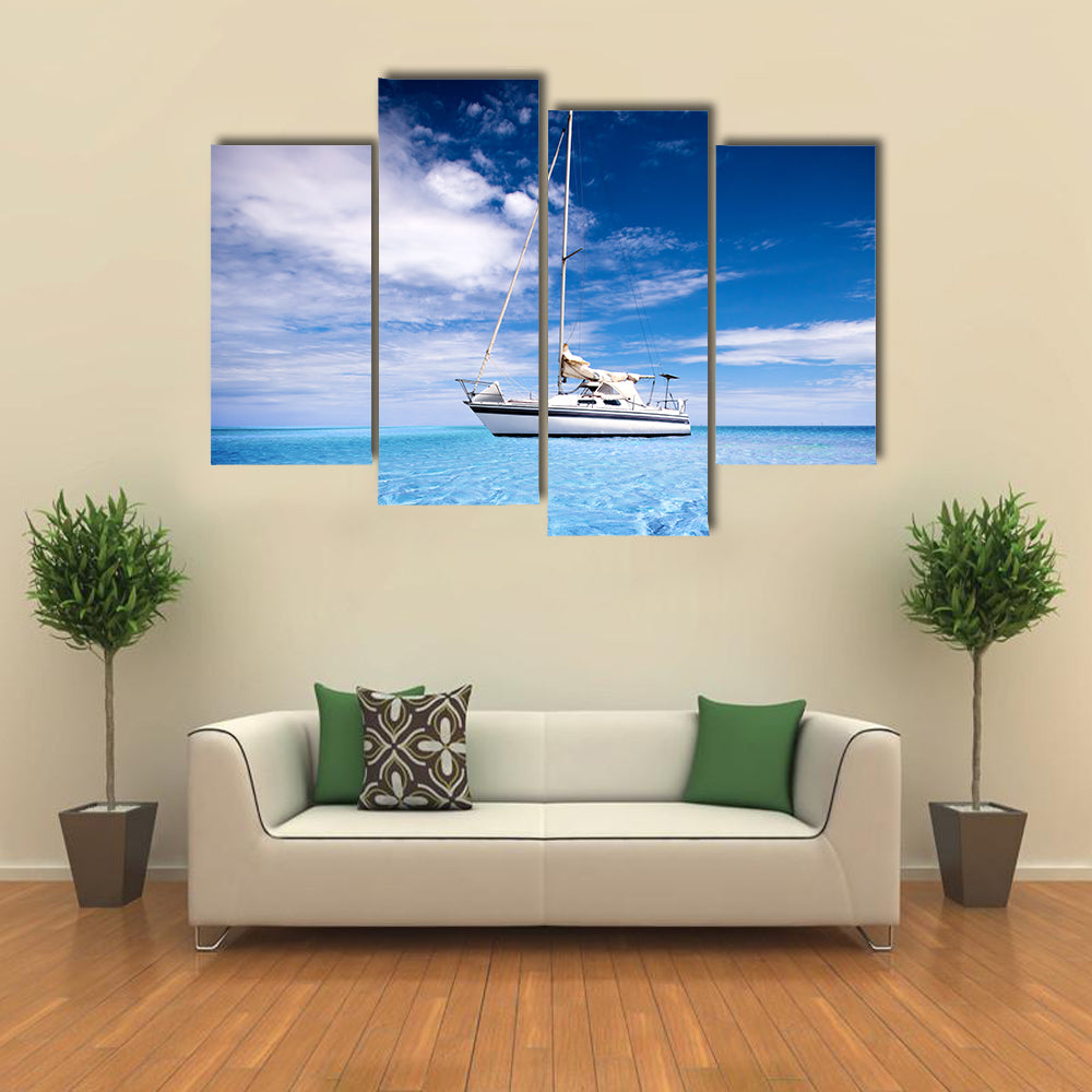 Single-masted White Sailboat on Turquoise Water Canvas Wall Art