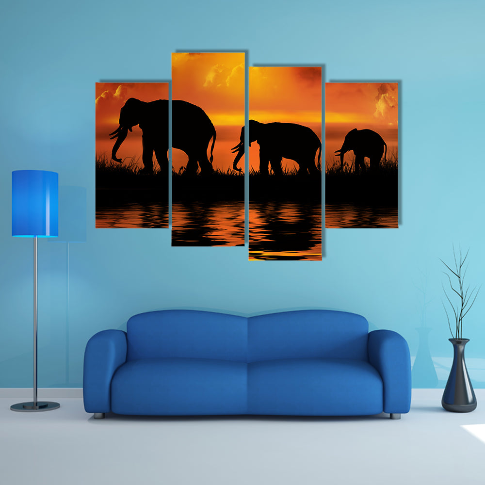 Three Elephants at Sunset Canvas Wall Art