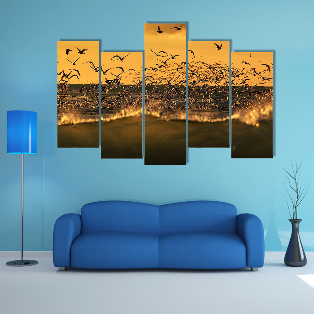 Seagulls Hovering Over Stormy Sea Canvas Wall Art