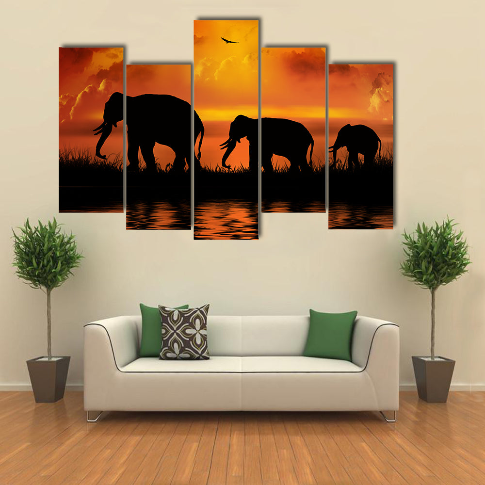 Three Elephants at Sunset Canvas Wall Art