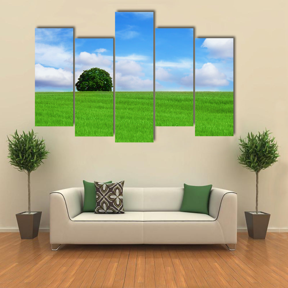 Lone Tree in Vibrant Green Field Canvas Wall Art