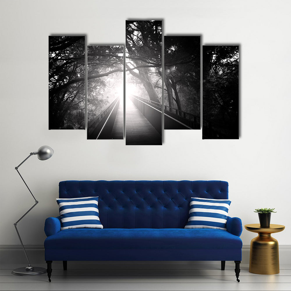 Wooden Bridge Into Sunlit Forest Canvas Wall Art