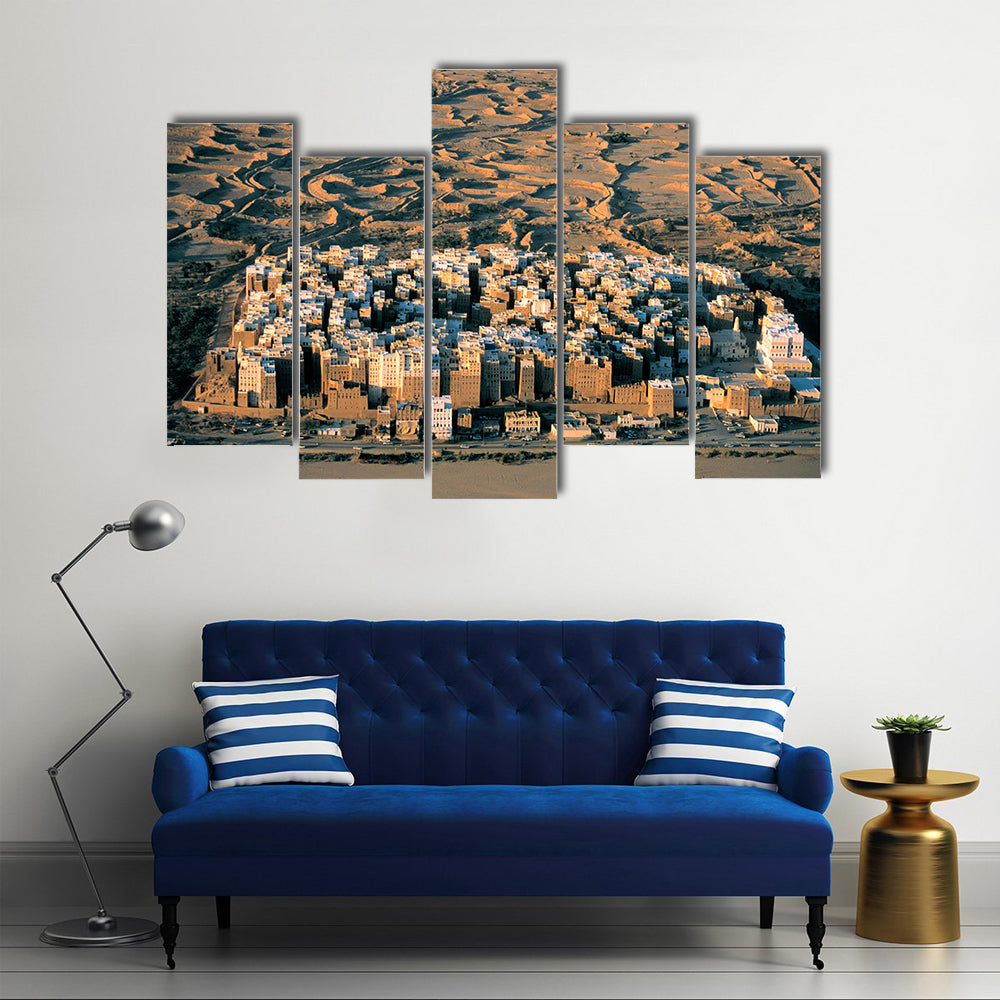Desert Settlement at Golden Hour Canvas Wall Art