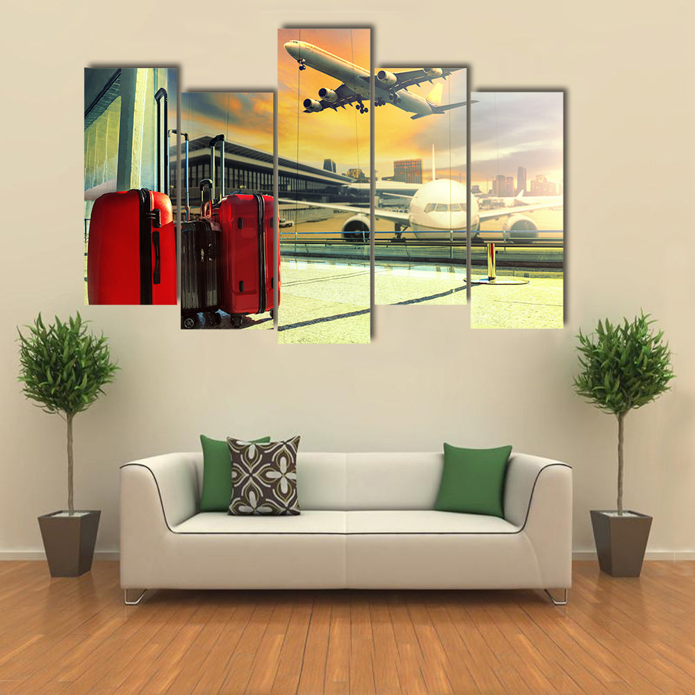 Red Suitcases and Plane at Sunset Canvas Wall Art