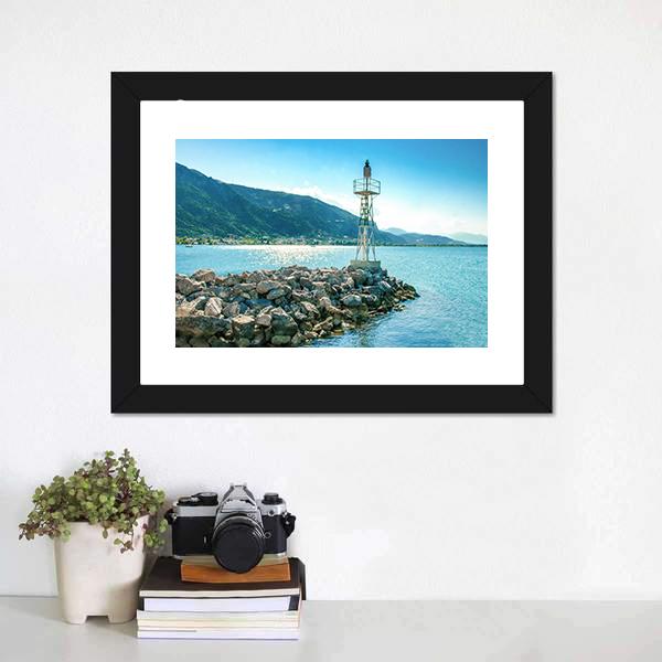 Lighthouse on Rocky Breakwater Canvas Wall Art