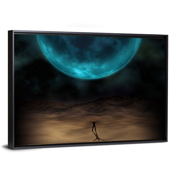 Silhouetted Figure Beneath Giant Blue Planet Canvas Wall Art