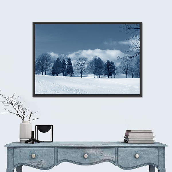 Snowy Field with Evergreens and Tracks Canvas Wall Art