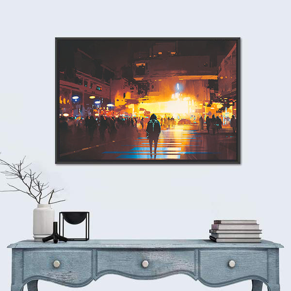 Lone Hooded Figure in Neon City Canvas Wall Art