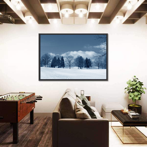 Snowy Field with Evergreens and Tracks Canvas Wall Art