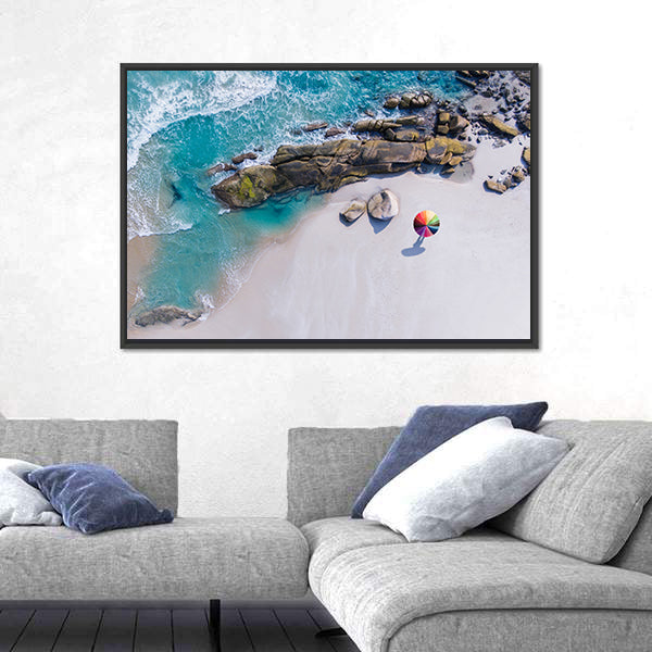 Umbrella On The Beach And Foam Of Sea Wave Canvas Wall Art