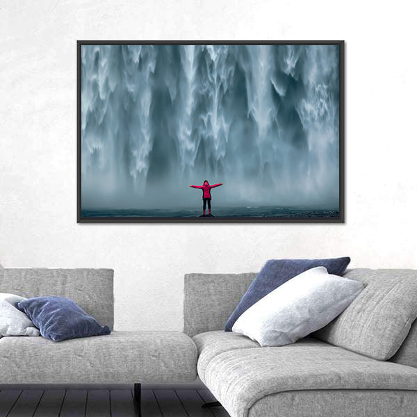 Girl Against Skogafoss Waterfall At South Iceland Canvas Wall Art