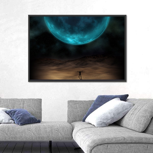 Silhouetted Figure Beneath Giant Blue Planet Canvas Wall Art
