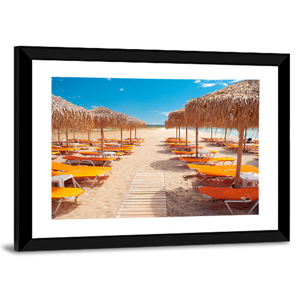 Greek Beach with Wooden Walkway and Orange Loungers Canvas Wall Art