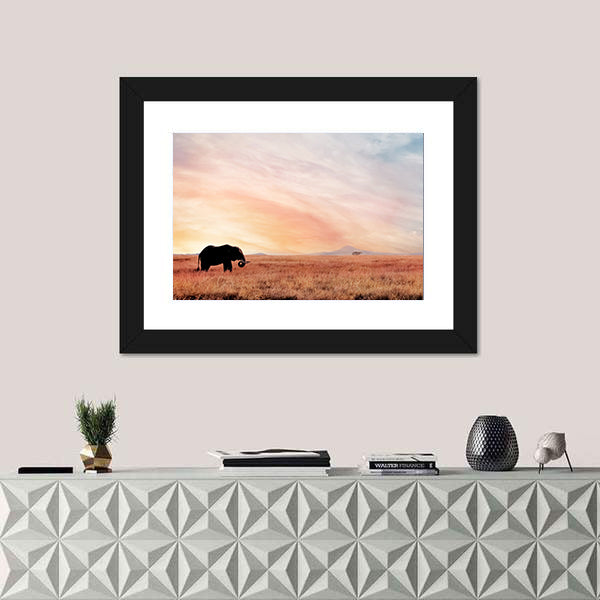 Lonely Elephant in Savannah Sunset Canvas Wall Art