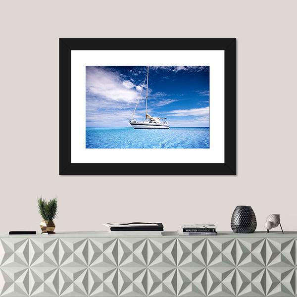 Single-masted White Sailboat on Turquoise Water Canvas Wall Art