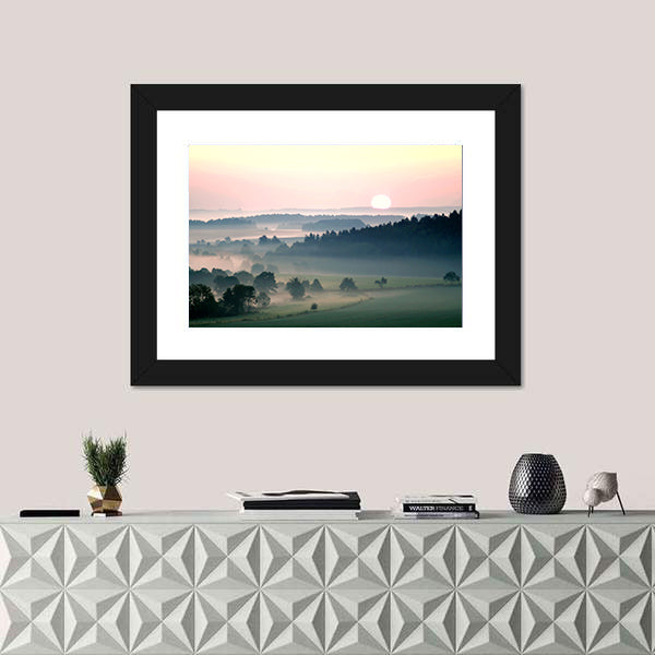 Misty Sunrise Over Layered Hills Canvas Wall Art