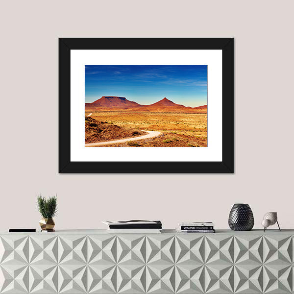 Winding Desert Road to Distant Peaks Canvas Wall Art