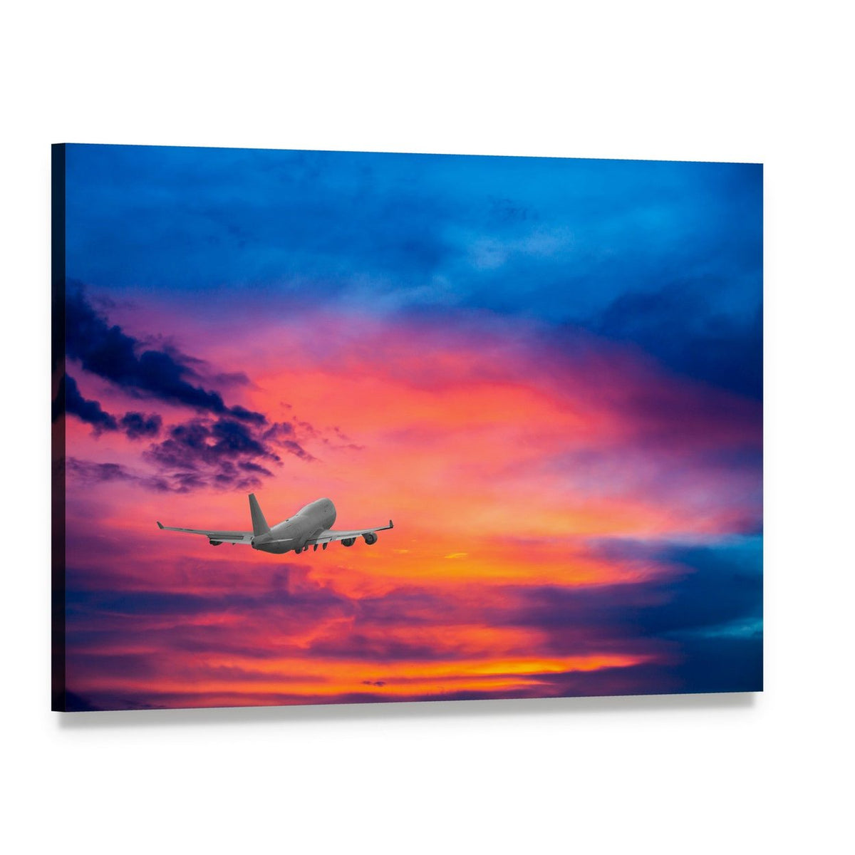Passenger Jet Over Vibrant Sunset Clouds Canvas Wall Art, single panel gallery wrapped canvas, angled product view
