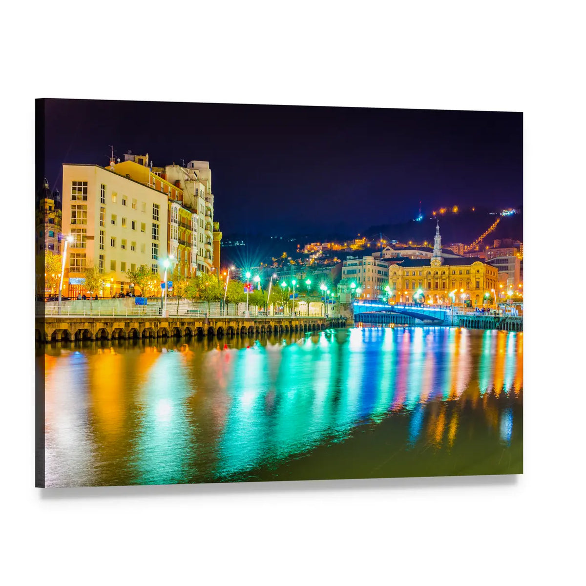Nighttime Riverside Cityscape with Yellow Building Canvas Wall Art, single panel gallery wrapped canvas, angled product view