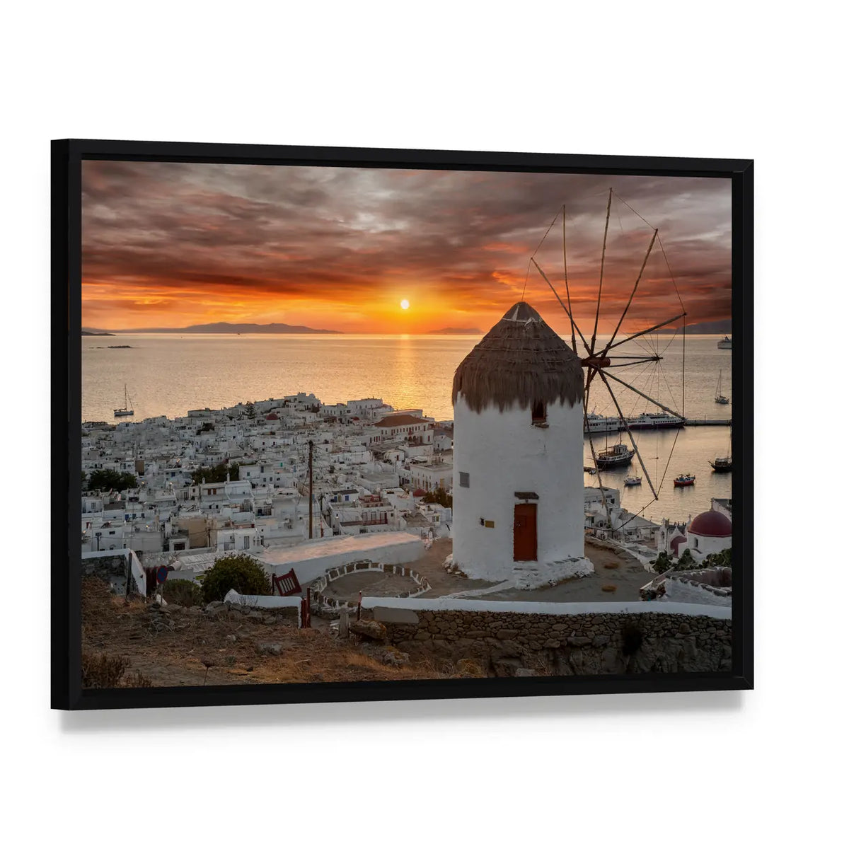 Mykonos Sunset with White Windmill Canvas Wall Art, framed canvas in a black floater frame, angled product view