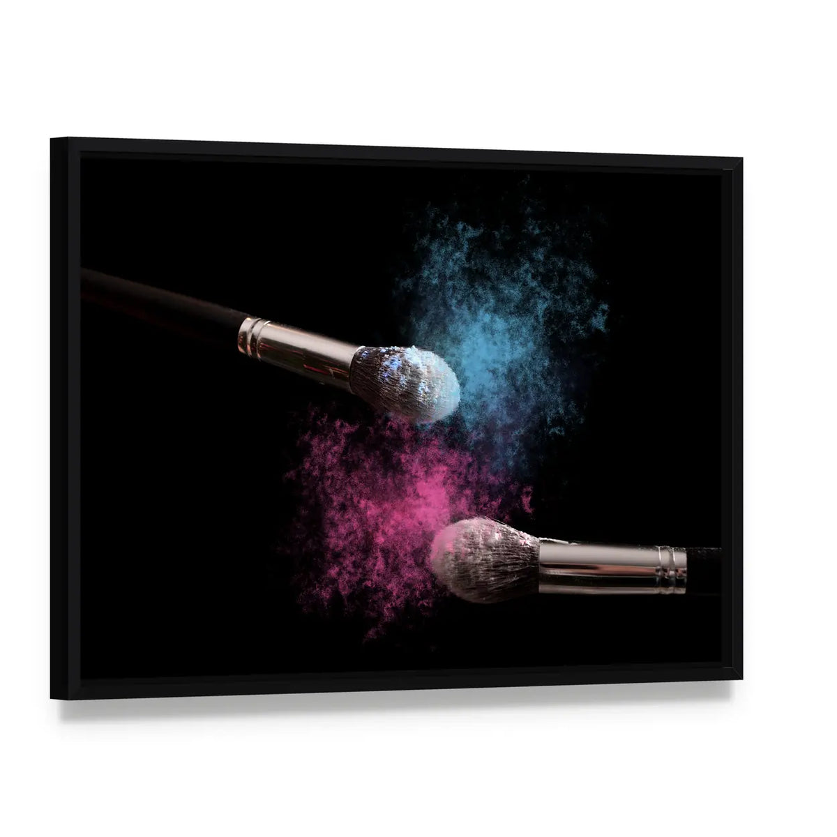Two Makeup Brushes Powder Explosion Canvas Wall Art, framed canvas in a black floater frame, angled product view