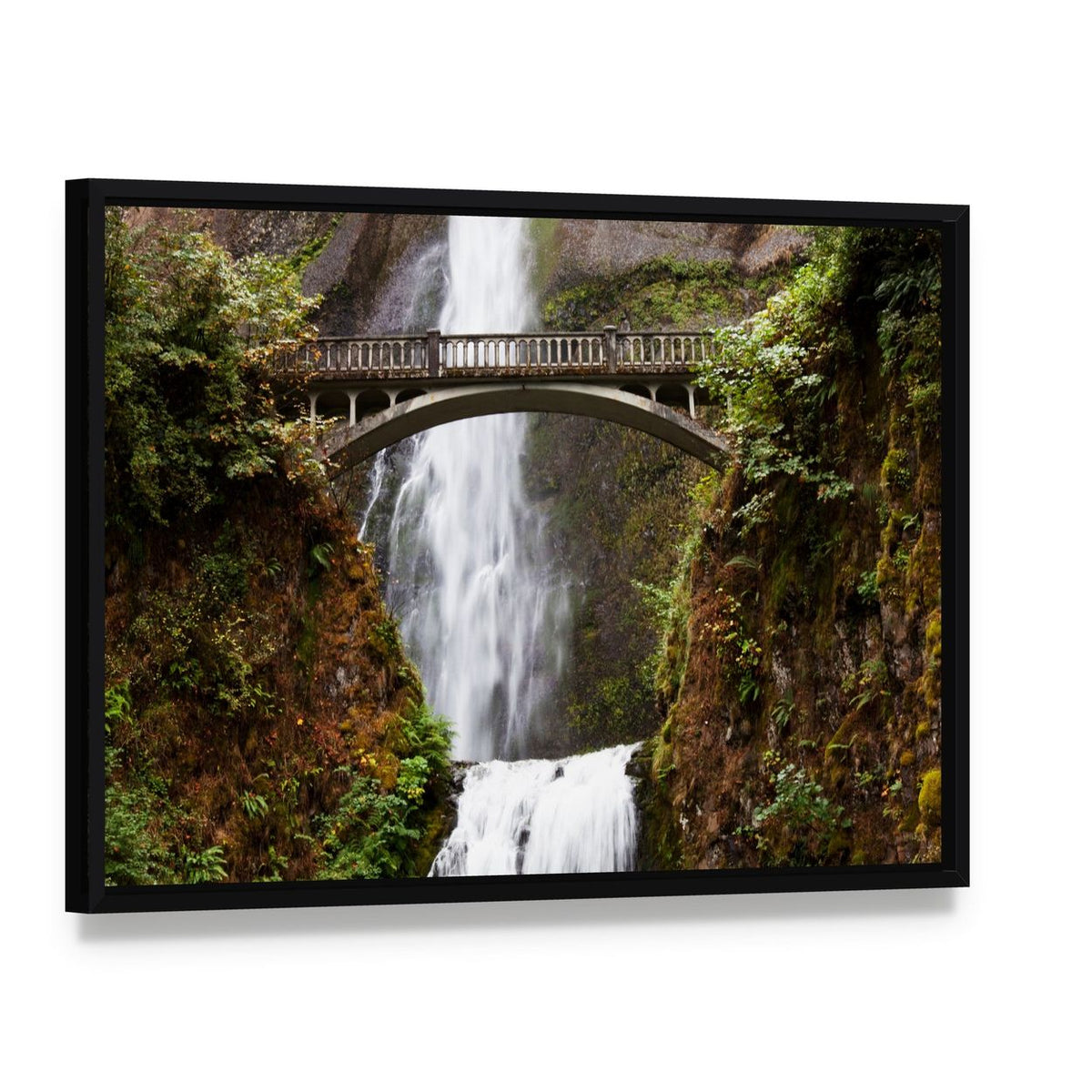 Multnomah Falls Waterfall and Stone Bridge Canvas Wall Art, framed canvas in a black floater frame, angled product view