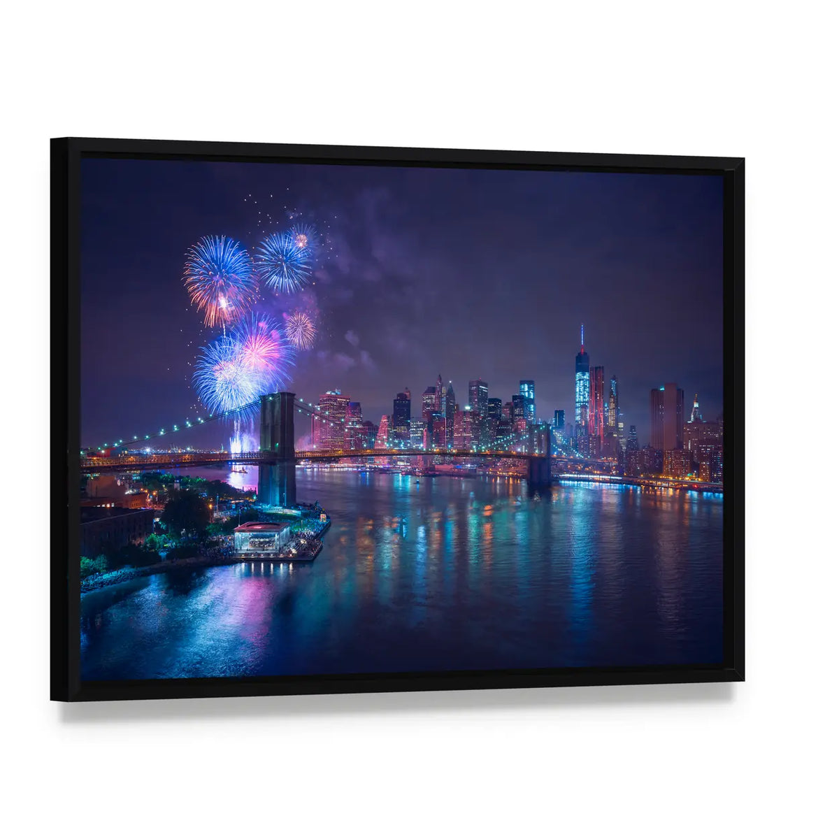 Fourth of July Fireworks Over New York Canvas Wall Art, framed canvas in a black floater frame, angled product view