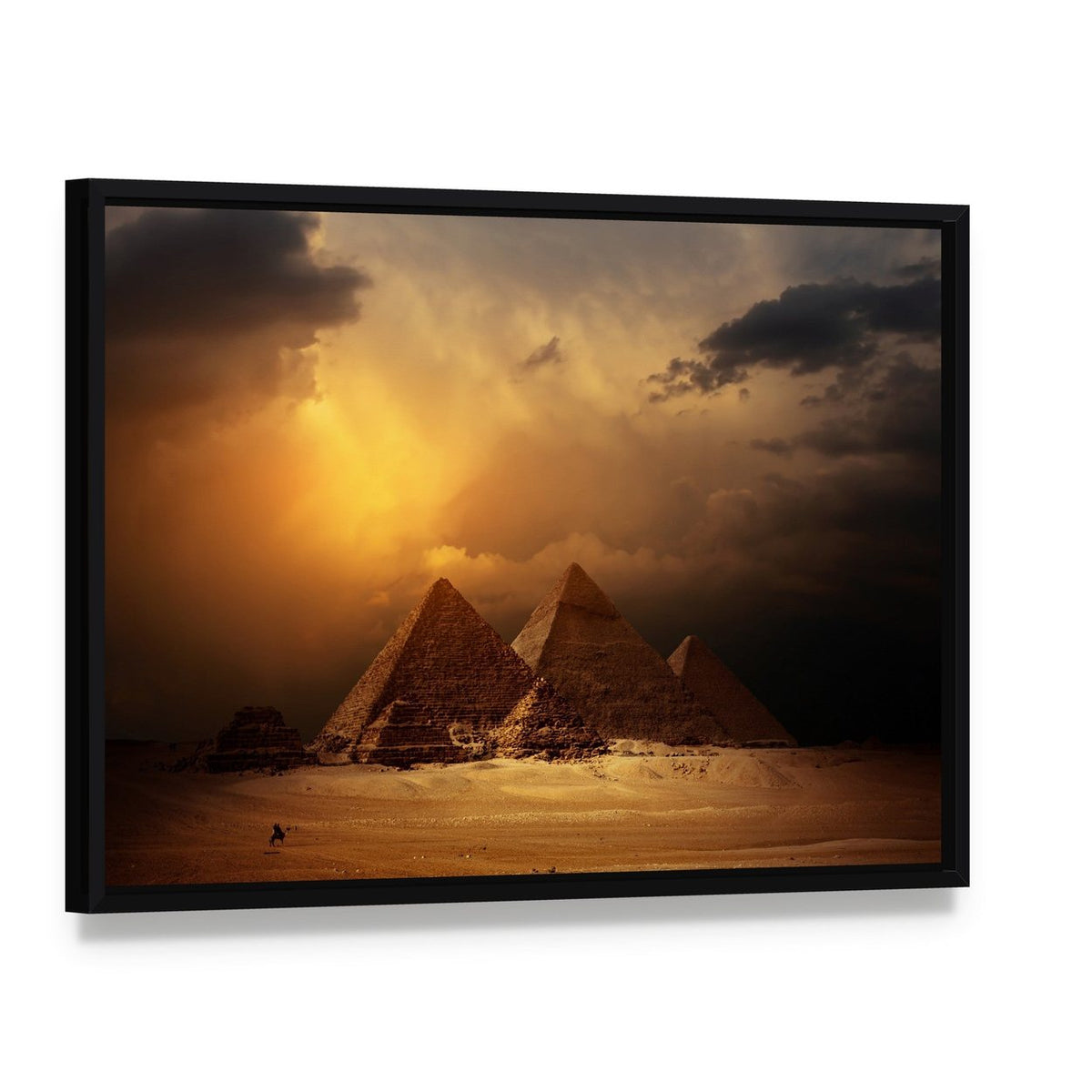 Pyramids in Giza Valley Under Dark Clouds Canvas Wall Art, framed canvas in a black floater frame, angled product view