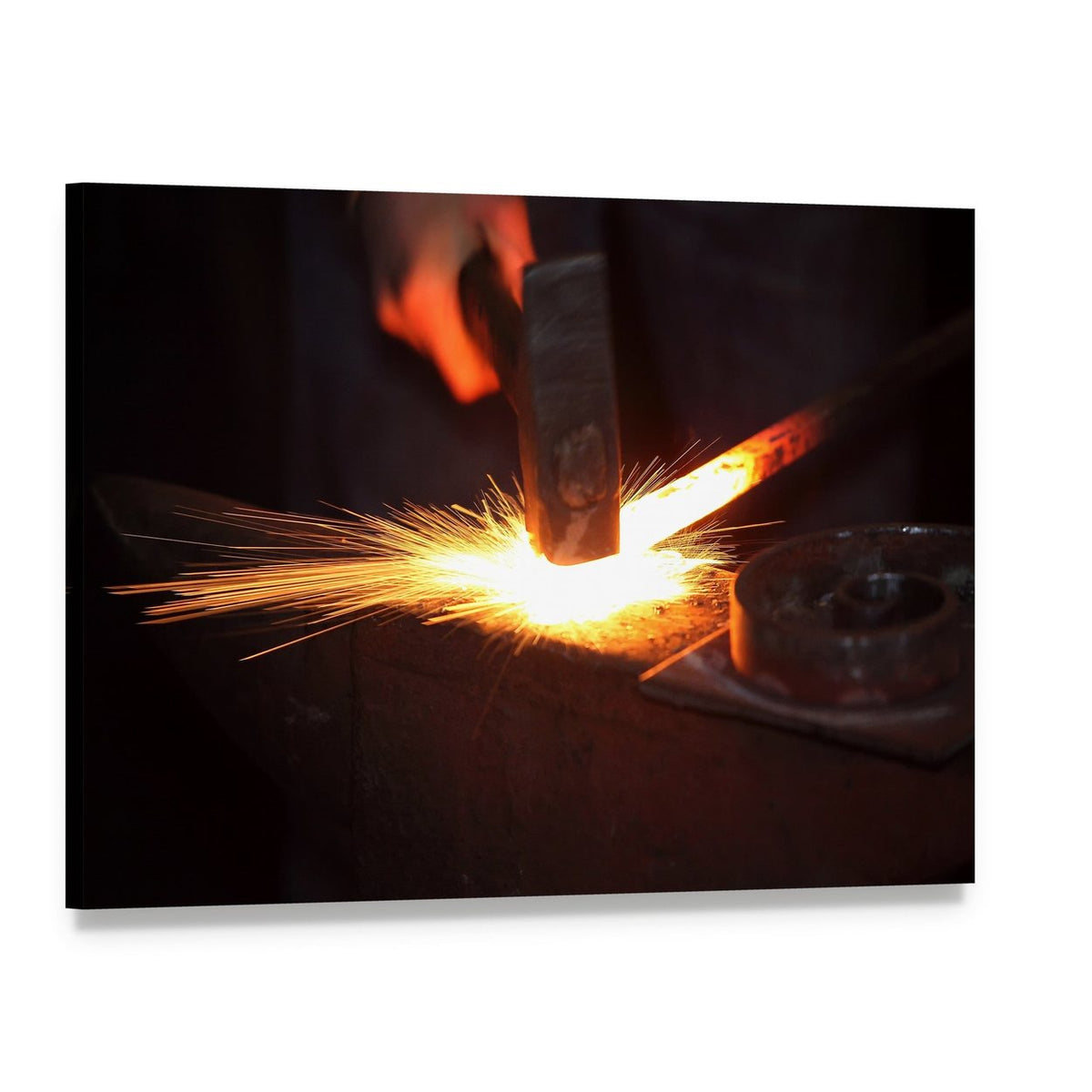 Blacksmith Hands Striking Glowing Metal Canvas Wall Art, single panel gallery wrapped canvas, angled product view
