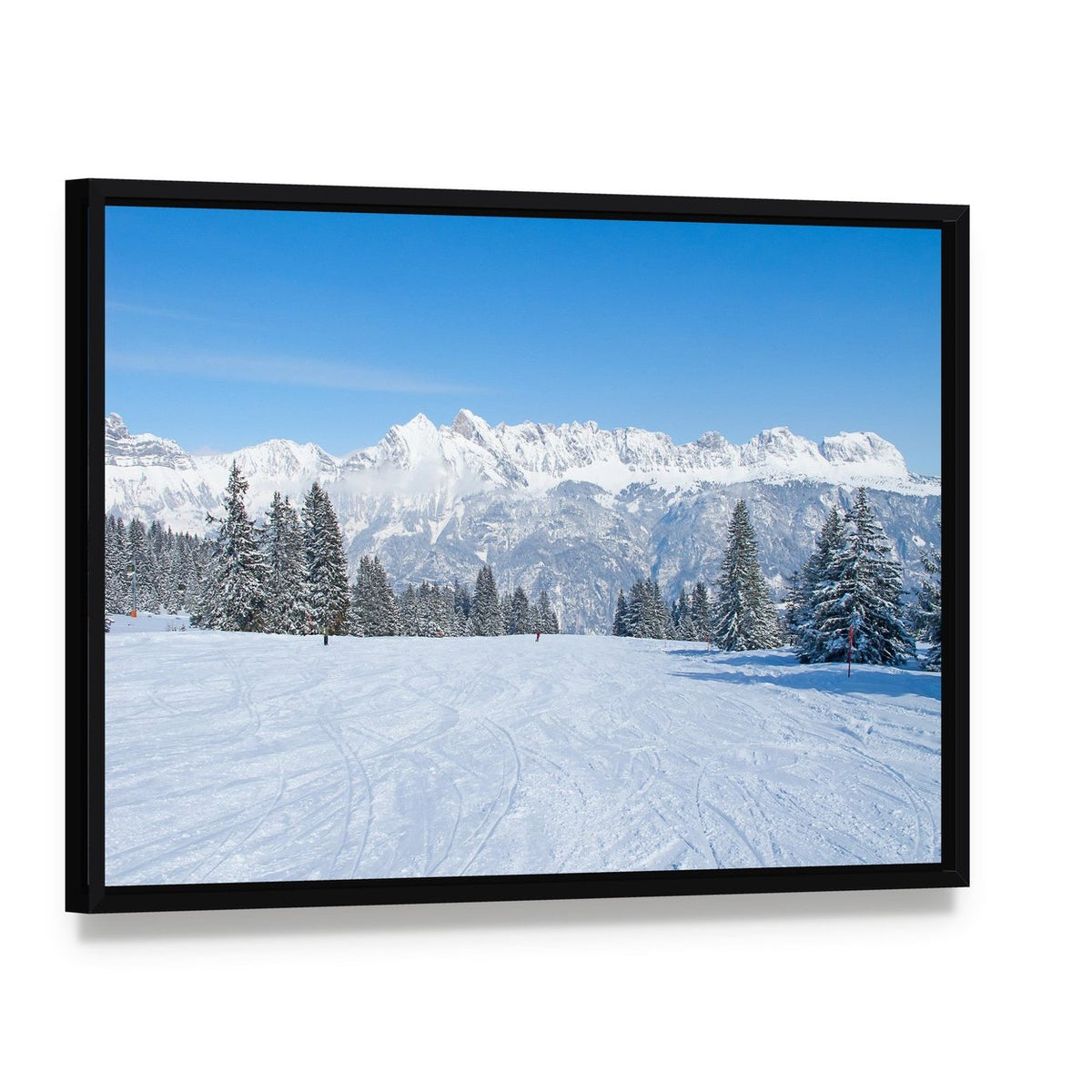 Snowy Ski Slope Landscape Canvas Wall Art, framed canvas in a black floater frame, angled product view