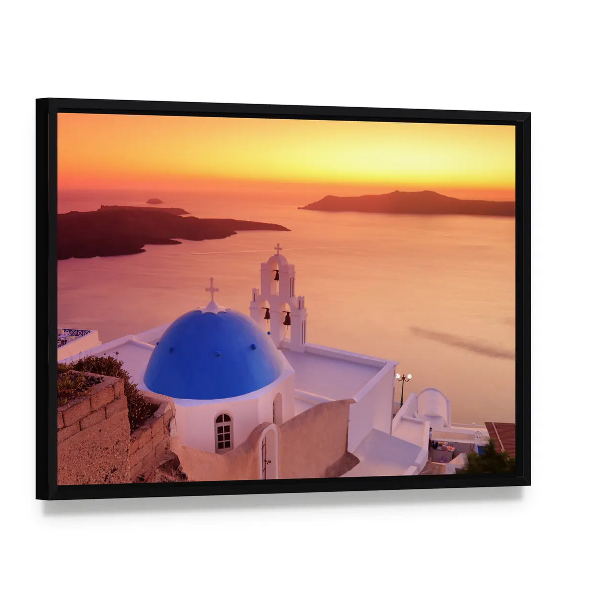 Santorini Church and Sunset Over Ocean Canvas Wall Art, framed canvas in a black floater frame, angled product view
