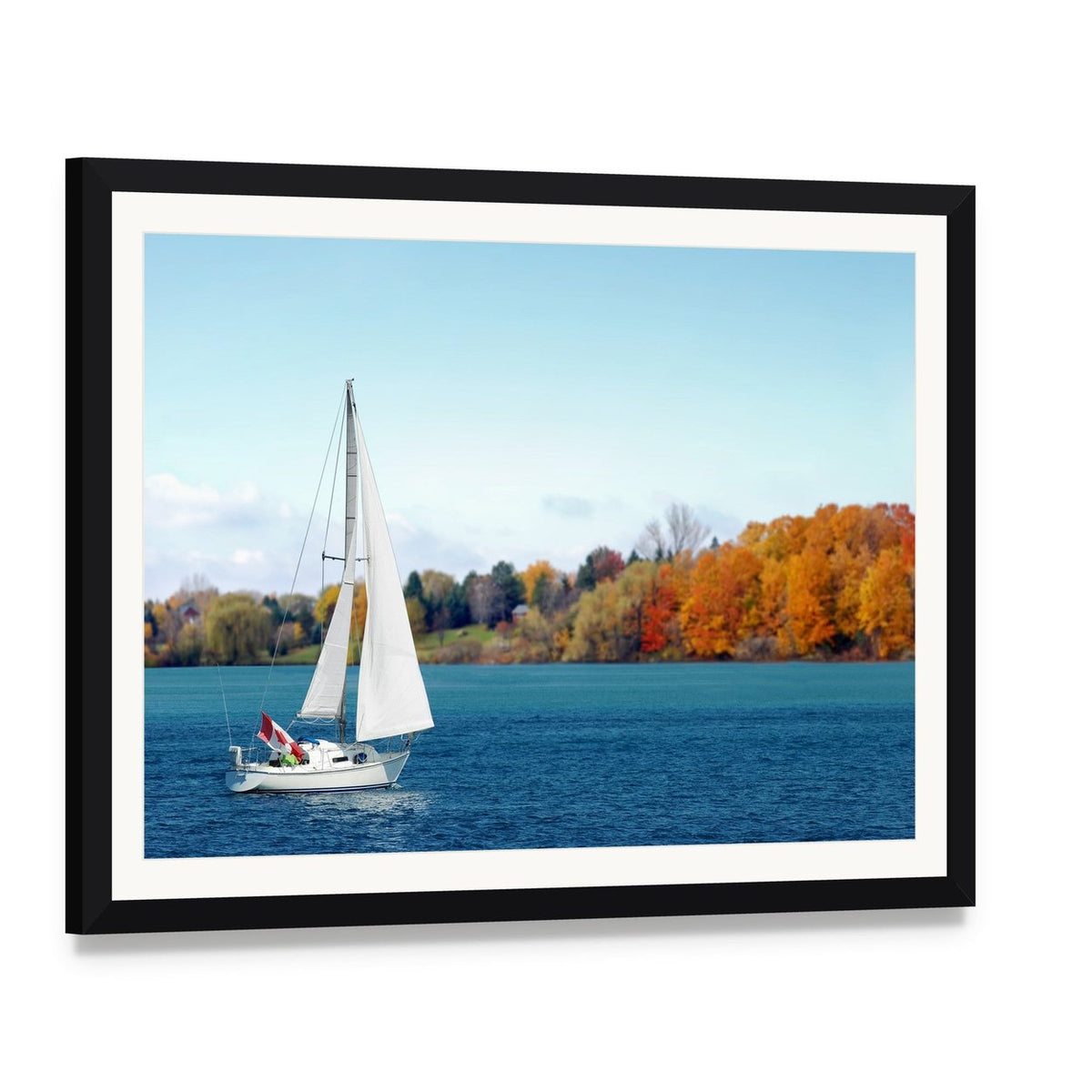 Canadian Sailboat on Lake Canvas Wall Art, framed print with white mat and black frame, angled product view