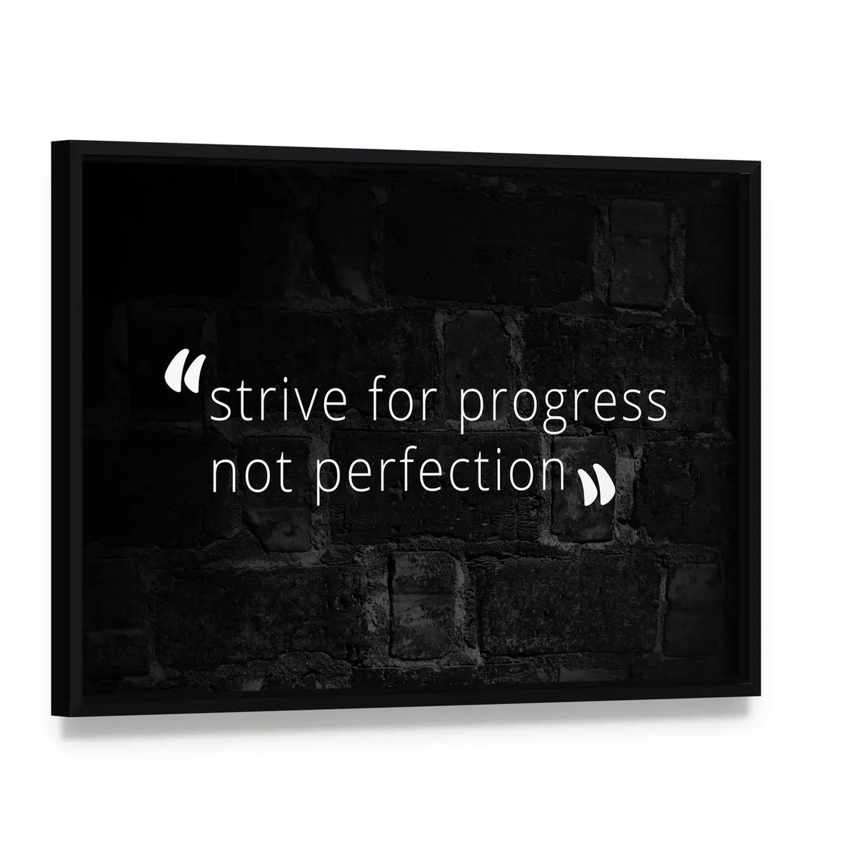 Strive for Progress Not Perfection Quote Canvas Wall Art, framed canvas in a black floater frame, angled product view