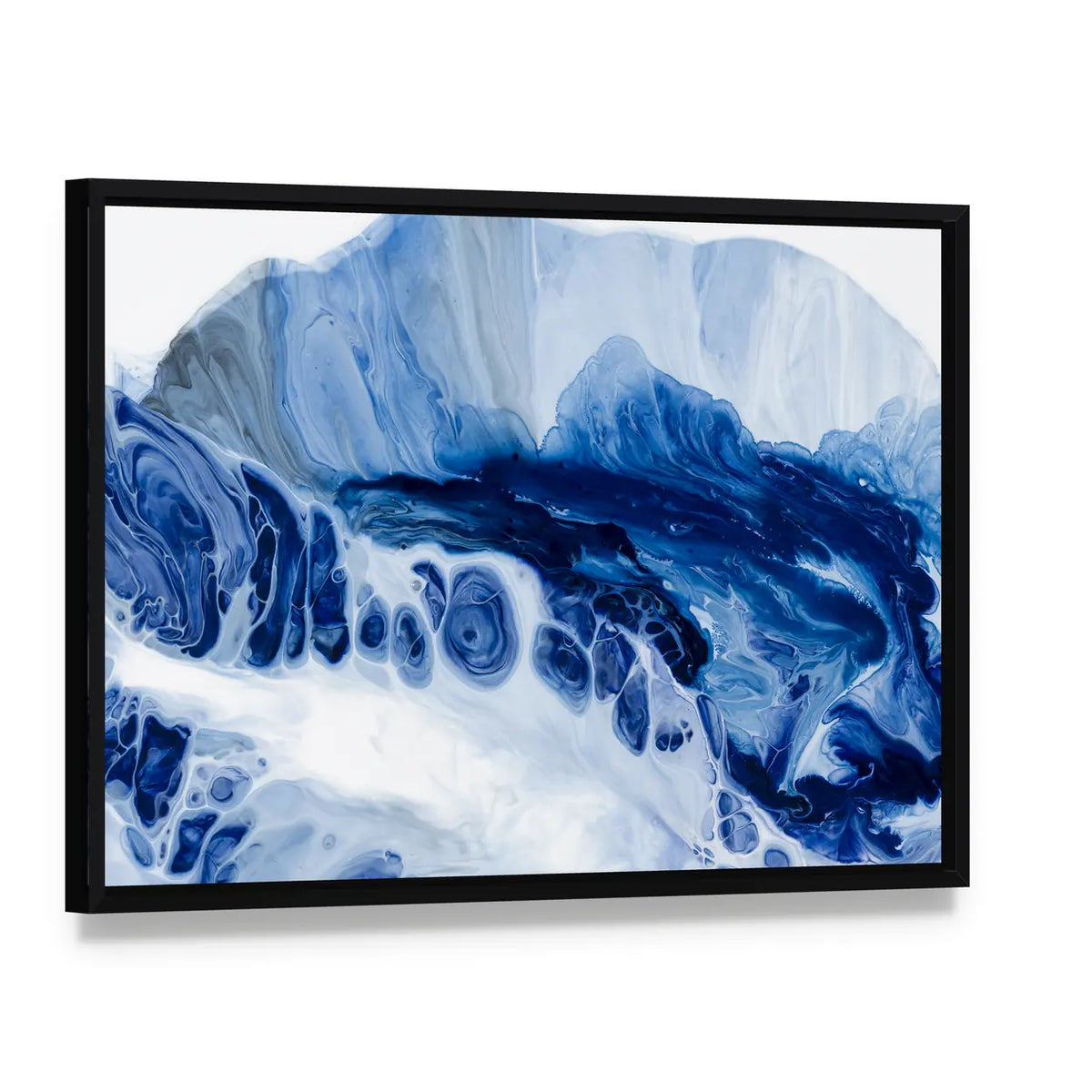 Blue Marbled Abstract with Dark Navy Center Canvas Wall Art, framed canvas in a black floater frame, angled product view