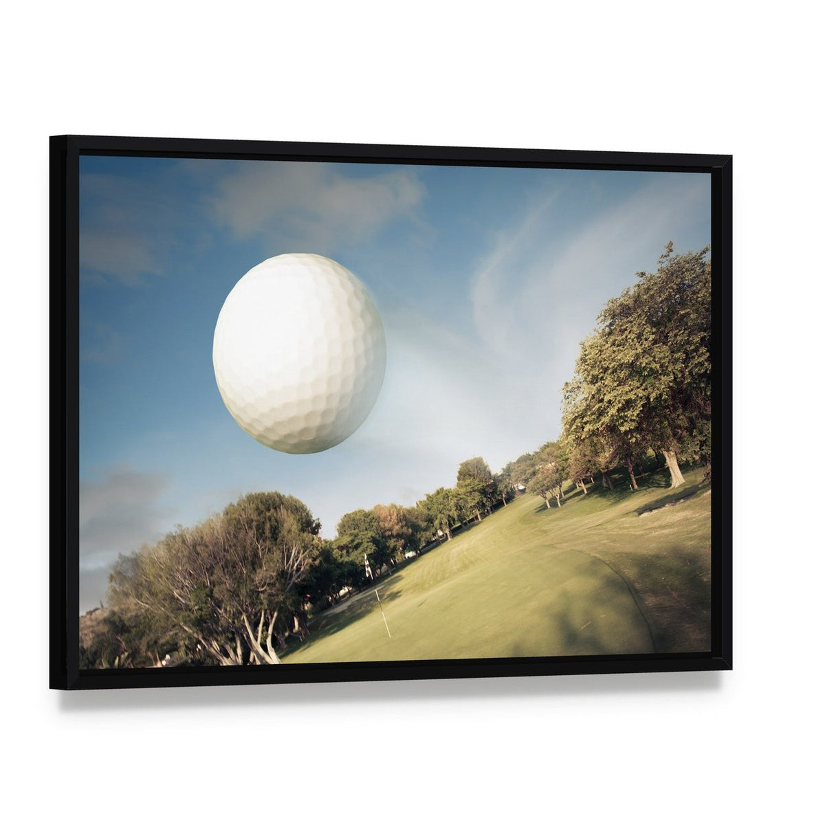 Flying Golf Ball Canvas Wall Art, framed canvas in a black floater frame, angled product view