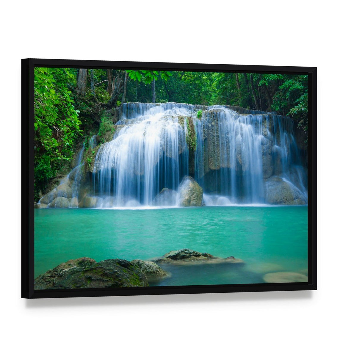Green Waterfall Canvas Wall Art, framed canvas in a black floater frame, angled product view