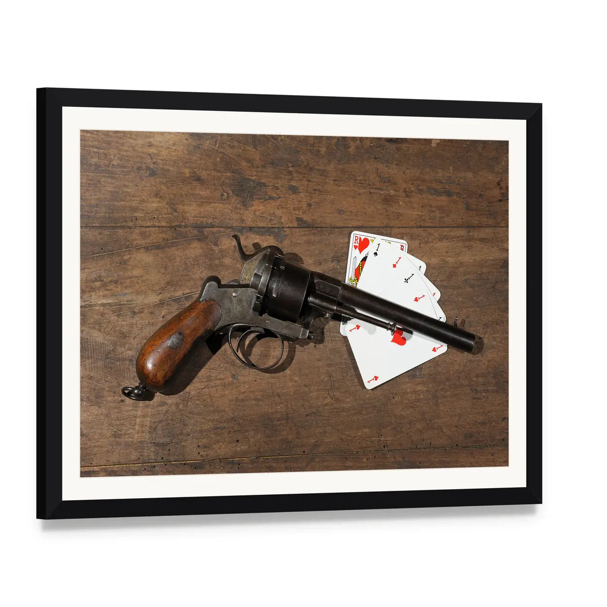 Antique Revolver and Playing Cards on Wooden Table Canvas Wall Art, framed print with white mat and black frame, angled product view