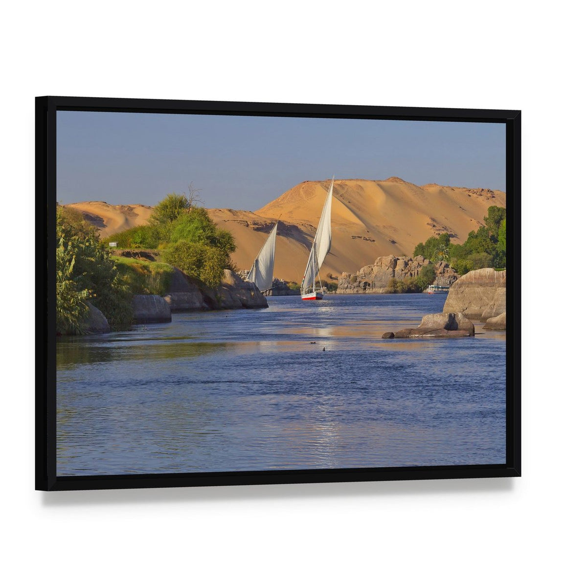 Sailing on the Serene Nile River Canvas Wall Art, framed canvas in a black floater frame, angled product view