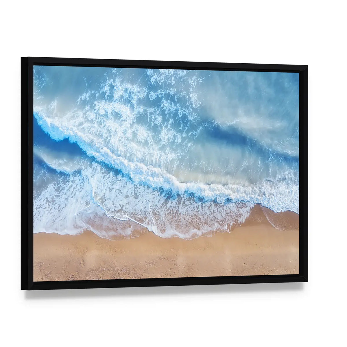 Beach And Waves From Top Canvas Wall Art, framed canvas in a black floater frame, angled product view