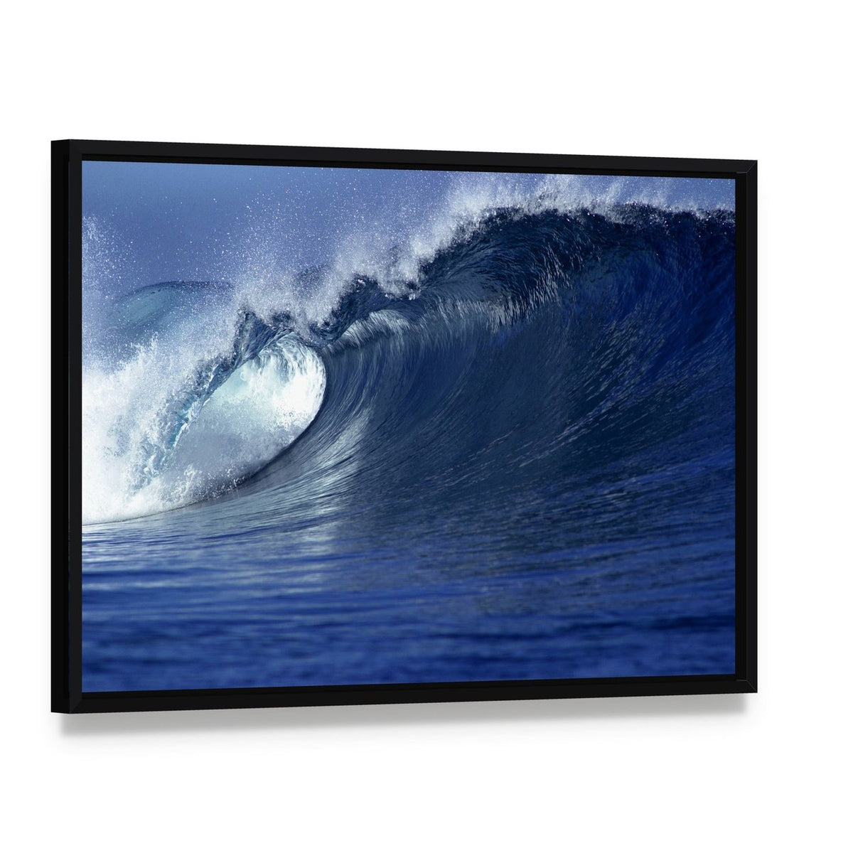 Cresting Wave in Ocean Canvas Wall Art, framed canvas in a black floater frame, angled product view