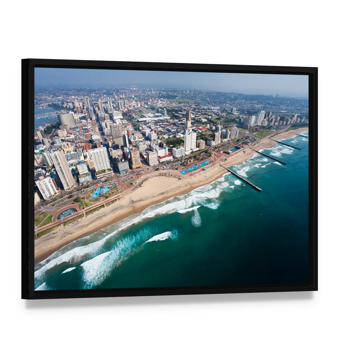 Durban Beach and City Skyline Canvas Wall Art, framed canvas in a black floater frame, angled product view